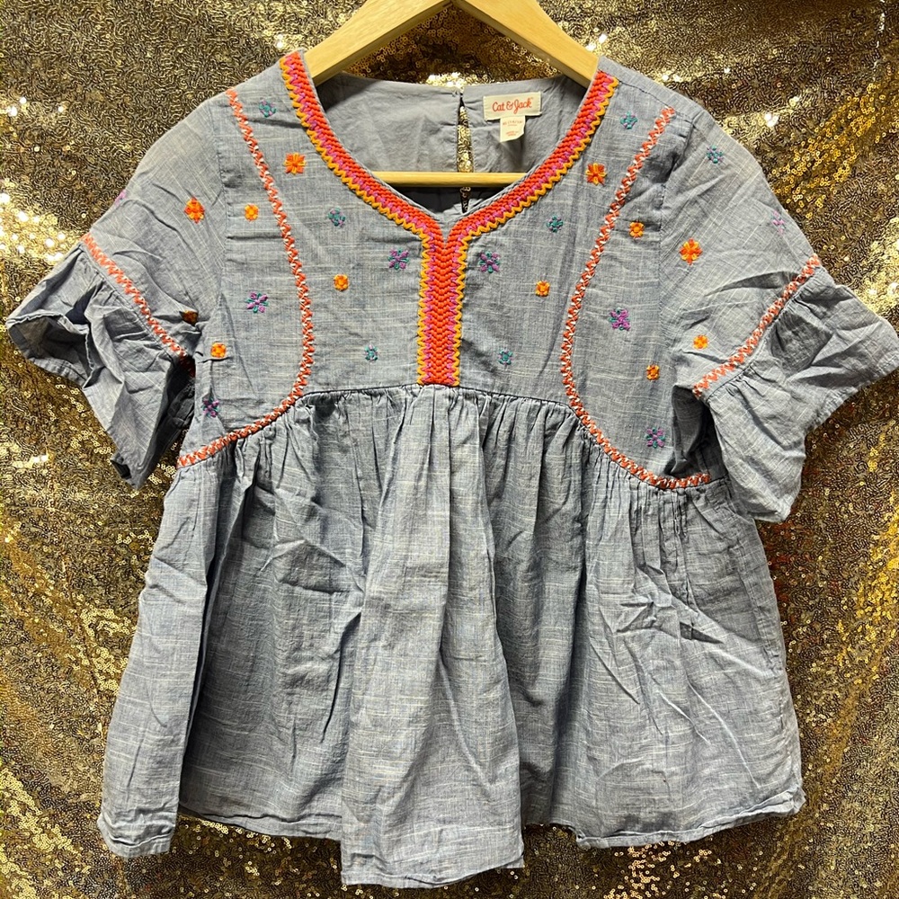 Babydoll style embroidered top